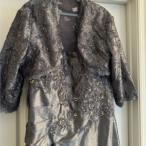 Lustrous Grace: Silver Spaghetti Strap Gown with Elegant Lace-Accented Jacket